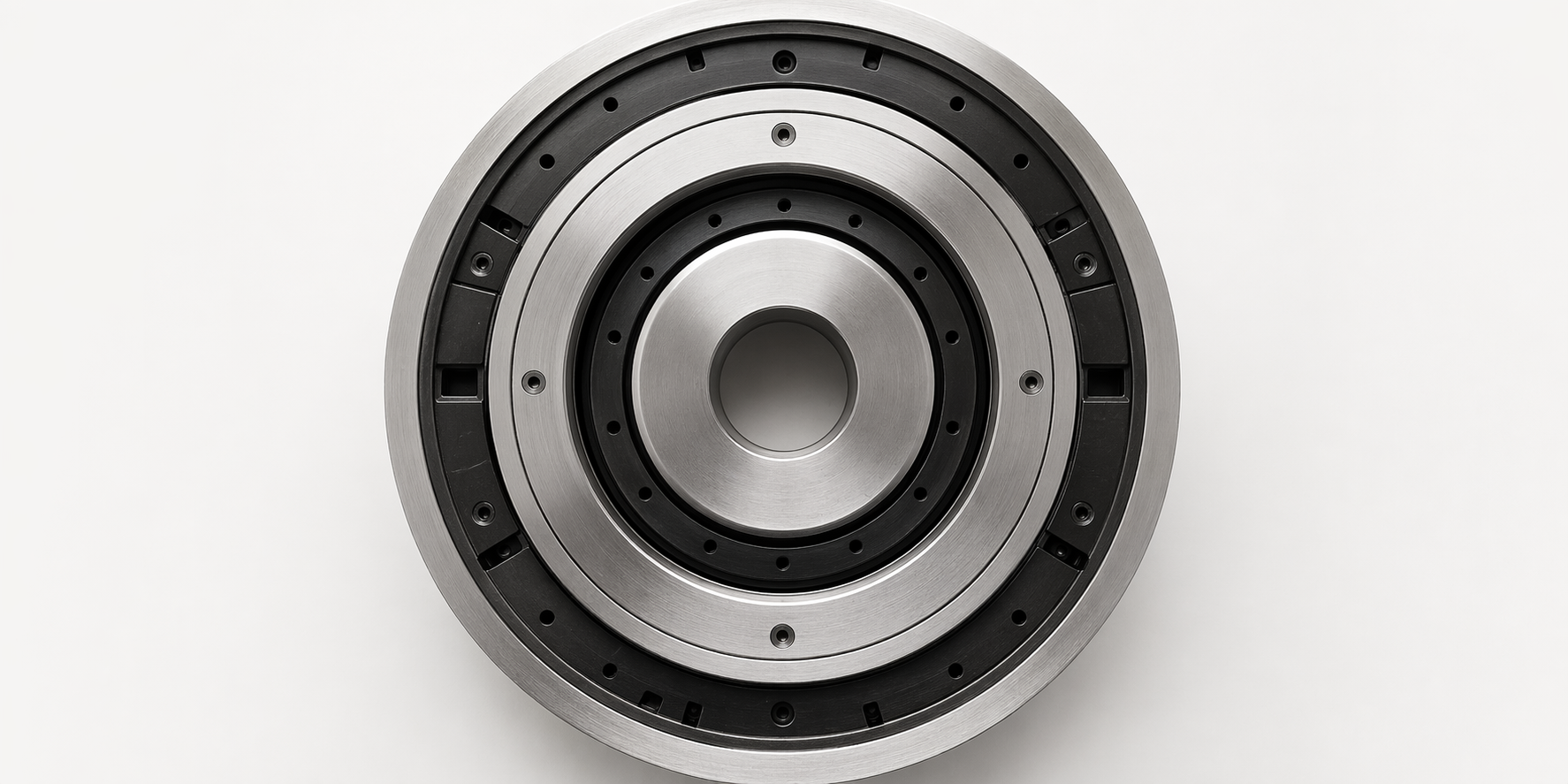 Circular machined steel assembly photographed from above